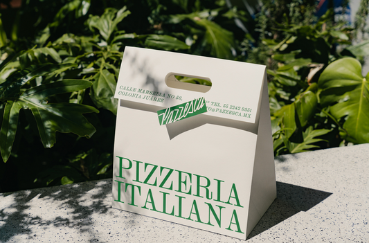 Eco-friendly packaging for a pizza brand. The packaging is white and green.